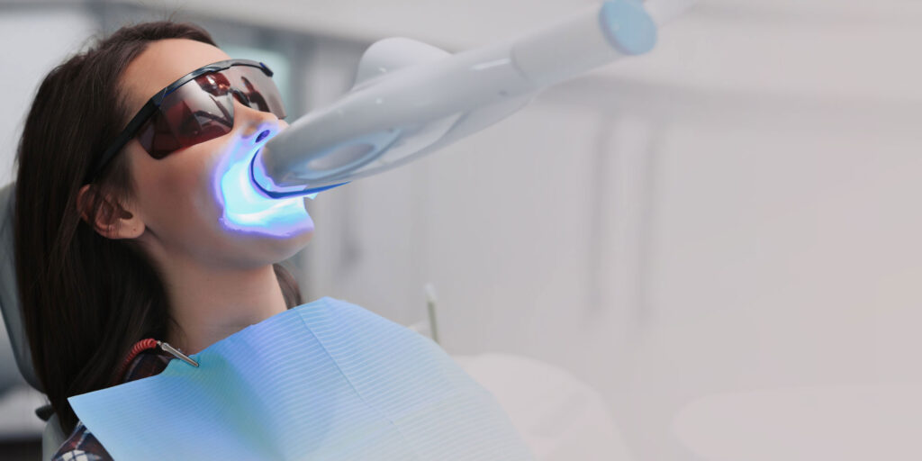 dental patient undergoing teeth whitening procedure
